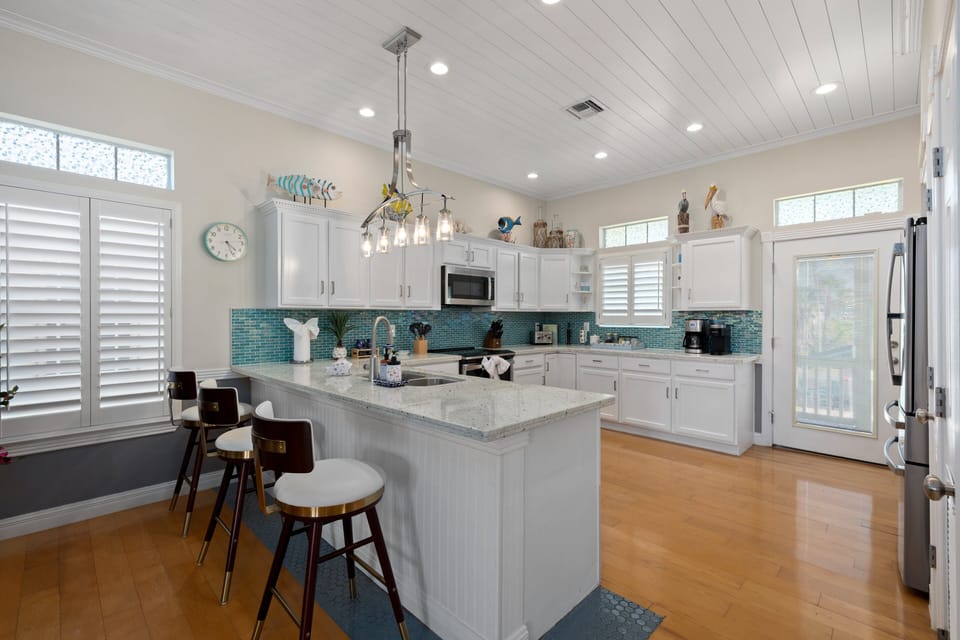 Gather around the spacious kitchen where meals, snacks, and conversations naturally come together.