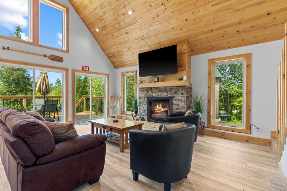 Relax by the cozy stone fireplace after a day exploring the Bruce Peninsula.