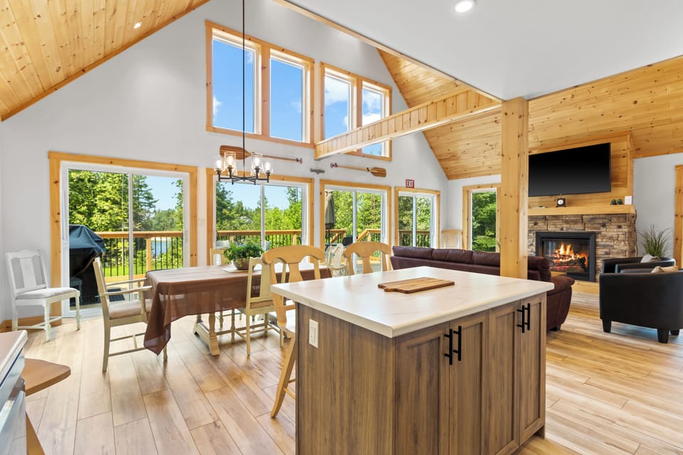 The spacious kitchen and dining area make gathering for meals easy and enjoyable.