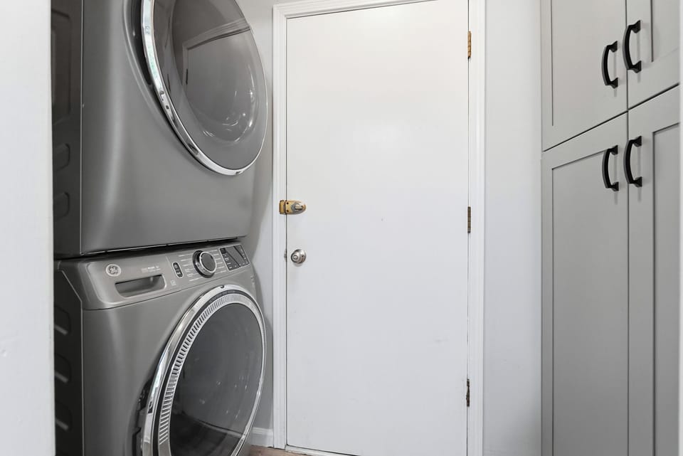 A stacked washer and dryer are available inside the home for convenient mid-stay laundry.