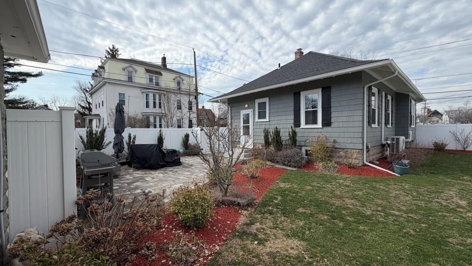 Fenced back yard retreat with patio