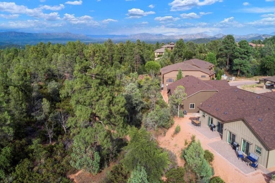 Aerial view showing home nestled amount the pines in beautiful Payson.