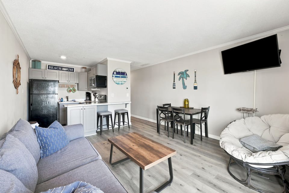 From the inviting sofa to the ocean views beyond, every corner of this condo is designed for comfort and relaxation