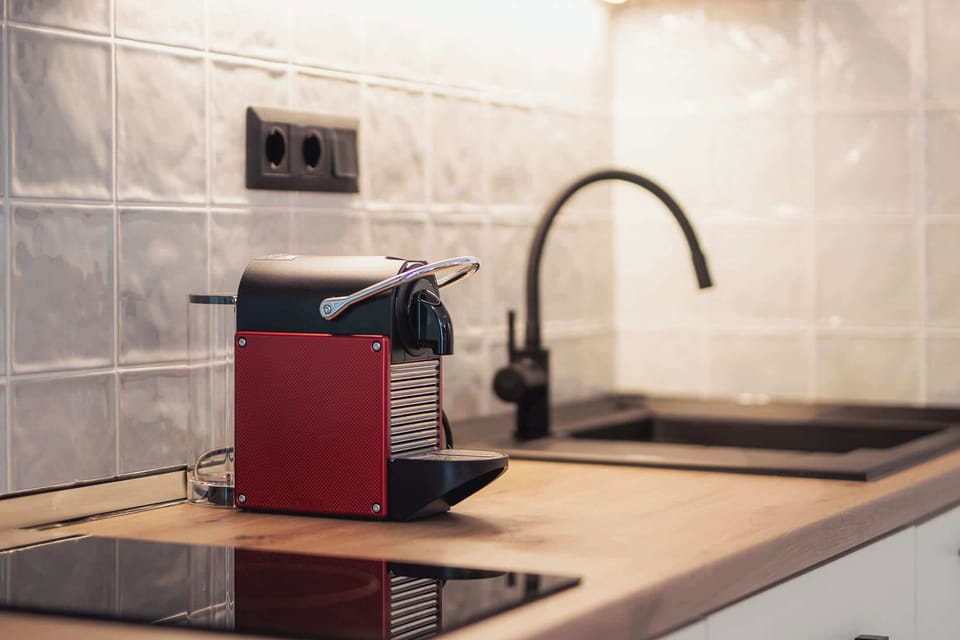 Wake up to the aroma of freshly brewed coffee with the Nespresso machine