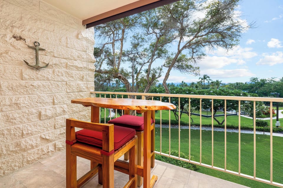 Start your mornings here with coffee and garden views. Your private balcony with bistro seating is the perfect spot to unwind and enjoy the lush surroundings.
