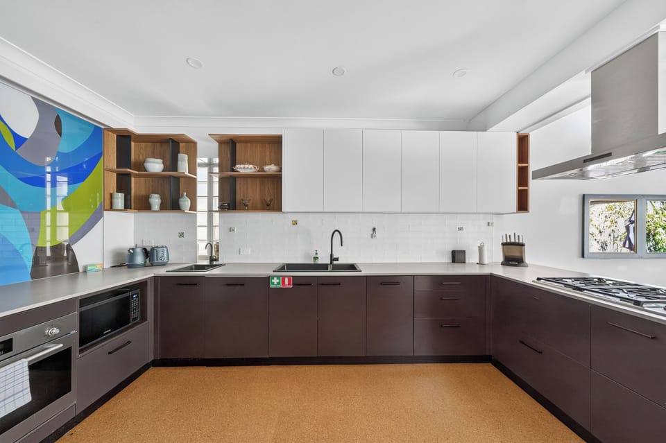 Cook with ease in the kitchen, where sleek finishes, generous bench space and quality appliances make everything from breakfast to dinner a pleasure.