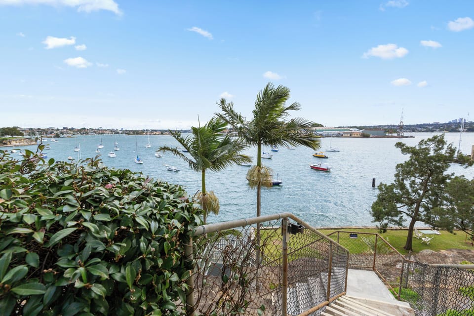 Follow the waterfront path to the shared gardens, where the bay unfolds before you and quiet moments by the water become part of your daily routine.