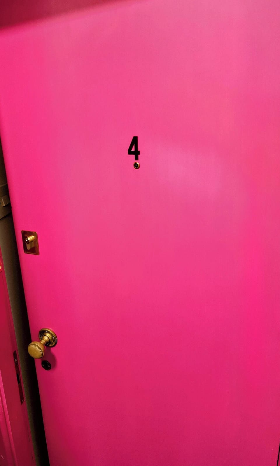 Bold pink entry door with stylish personality and memorable curb appeal