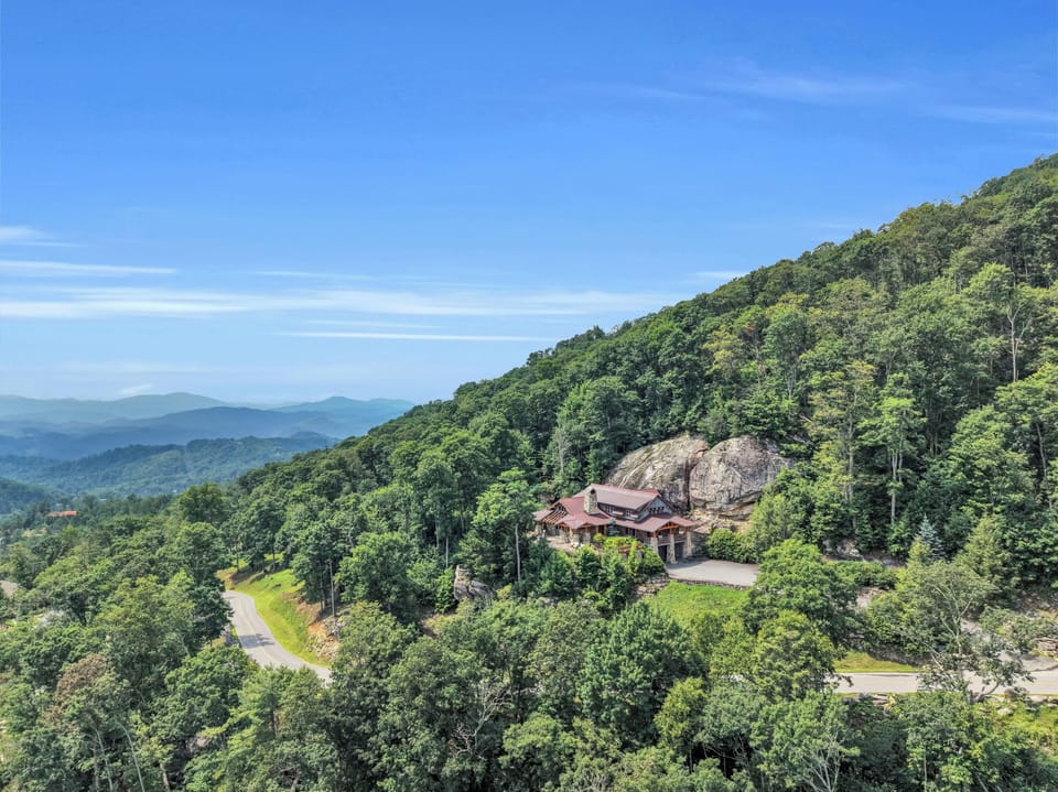 The Blue Ridge unfolds in every direction here, layer after layer of ridgeline stretching toward the horizon.