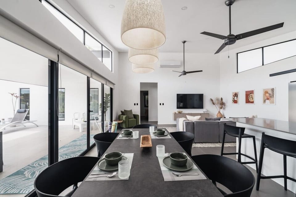 One space, every reason to stay in it. From the dining table to the pool just steps away, this is a home that keeps everyone connected, relaxed, and exactly where they want to be.