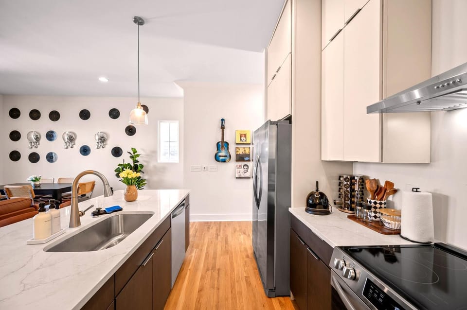 Bright, modern, and thoughtfully designed, this kitchen features stainless steel appliances, ample counter space, and everything you need to feel right at home.