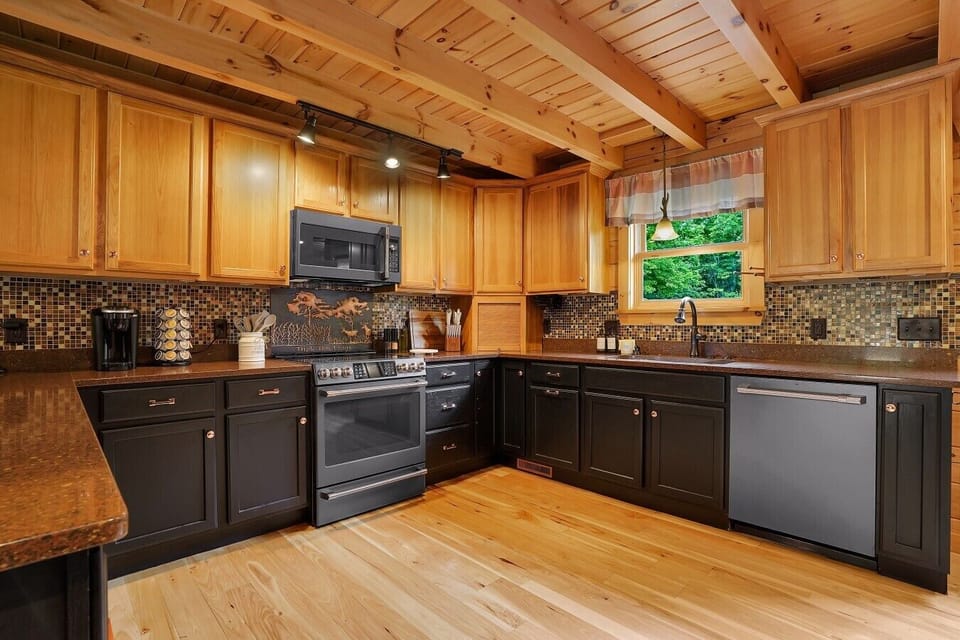 Kitchen with Electric Stovetop, stocked with all dishes and necessities.