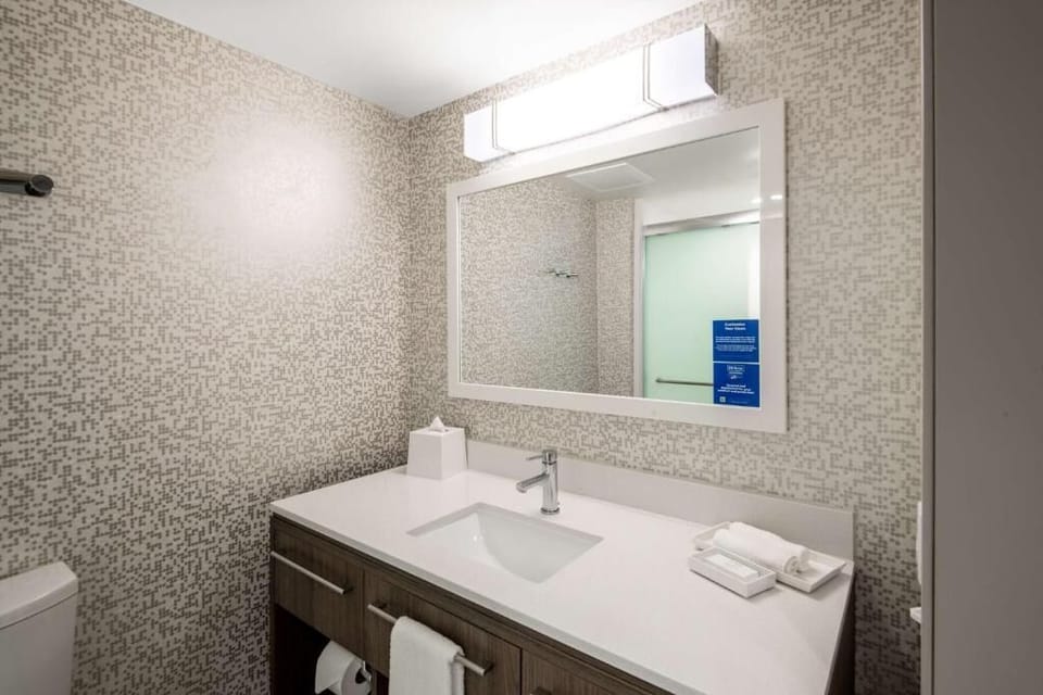 Enjoy a spotless, modern bathroom designed for quick, easy routines.