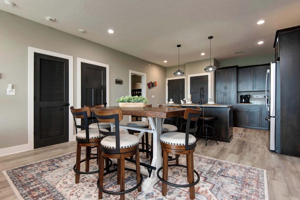 Gather together for meals, games, and conversation while enjoying beautiful lake views from the dining area.