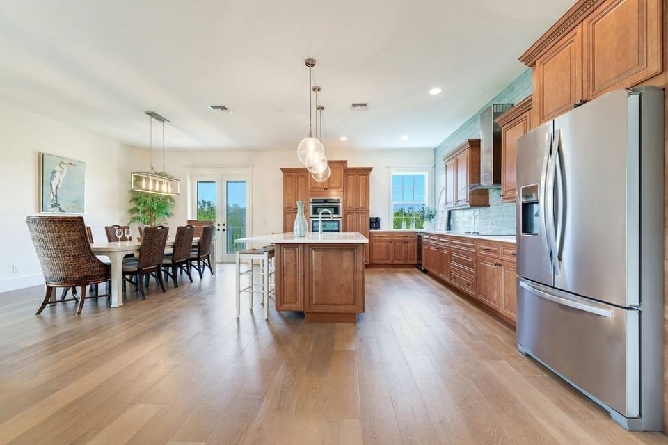 The dining area opens onto the kitchen for easy meals.