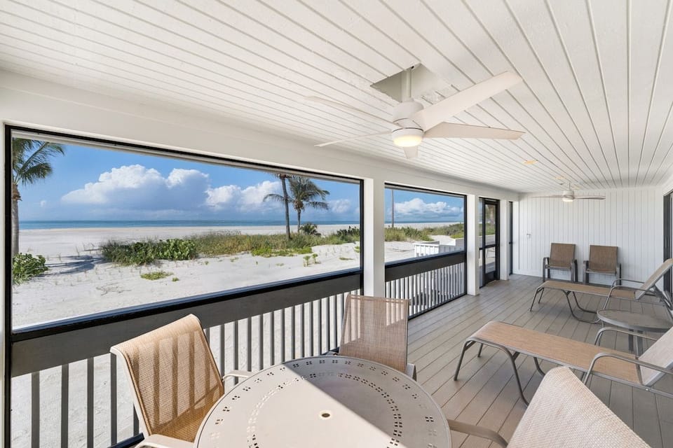 The screened lanai extends the living space outdoors.
