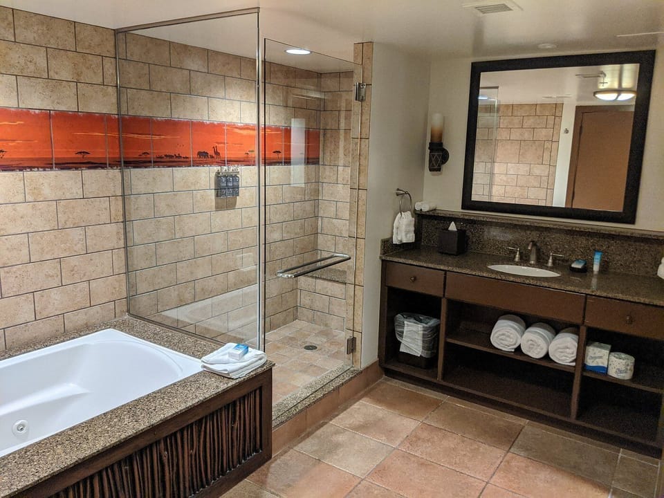 Primary Bathroom • Jetted Tub + Glass Shower