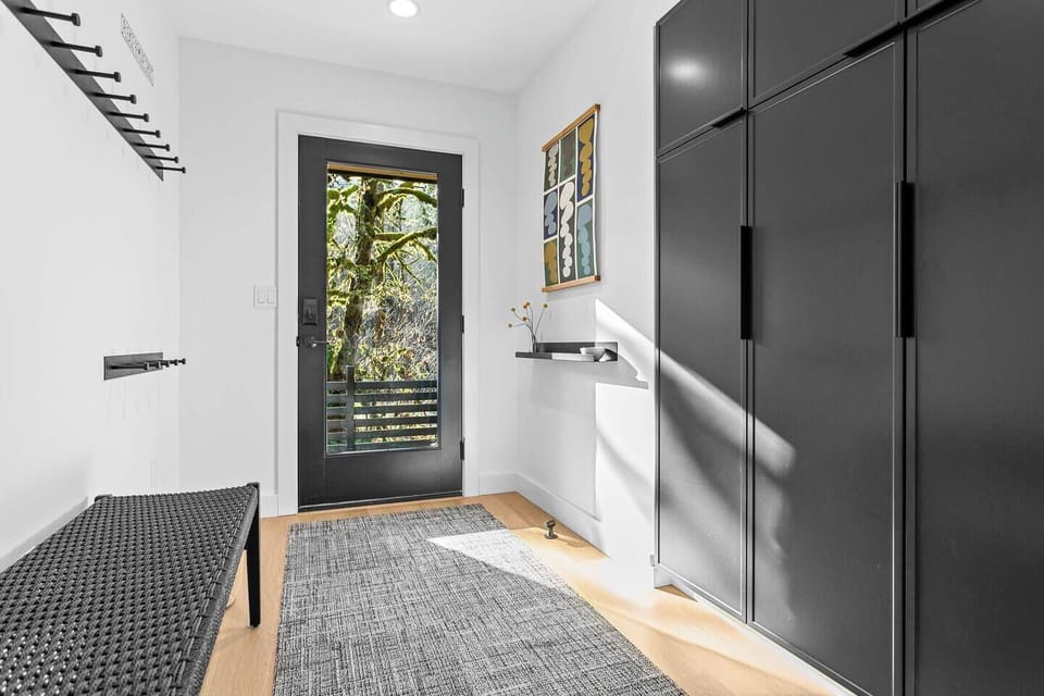 Large entry with lots of coat hooks and storage.