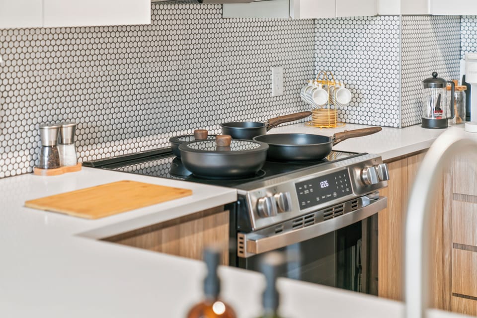 Modern, fully equipped kitchen with sleek finishes and stylish details