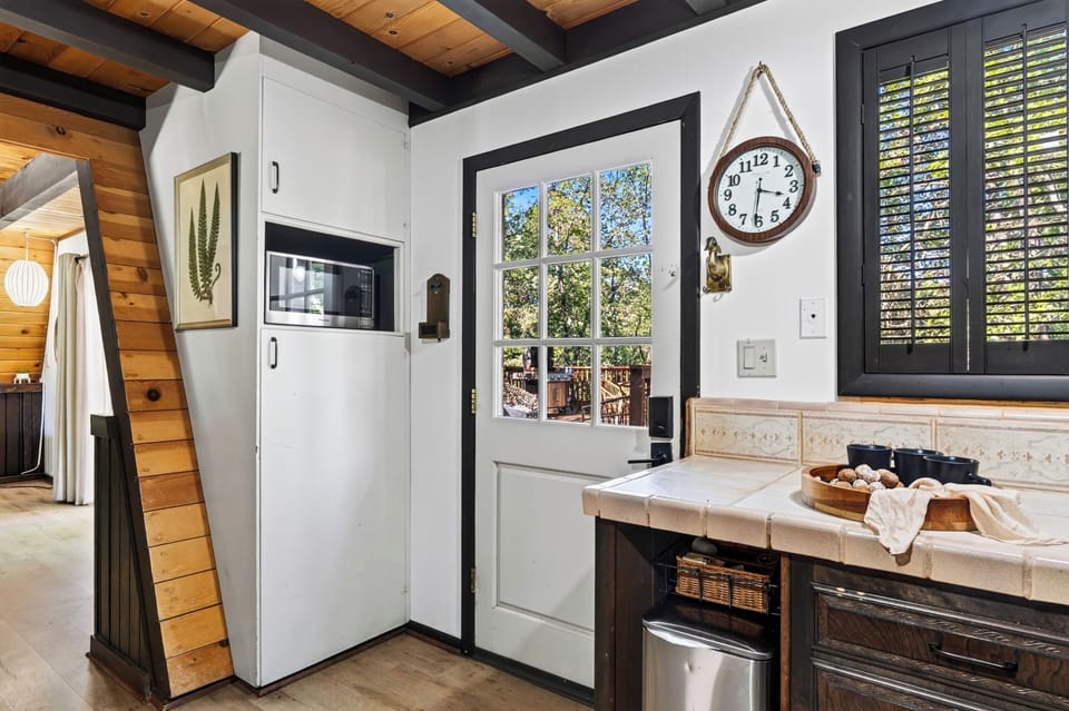 Kitchen entry door leading out to the deck area.