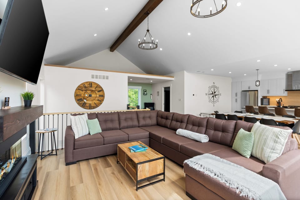 The open-concept living area offers plenty of comfortable seating for the whole group.