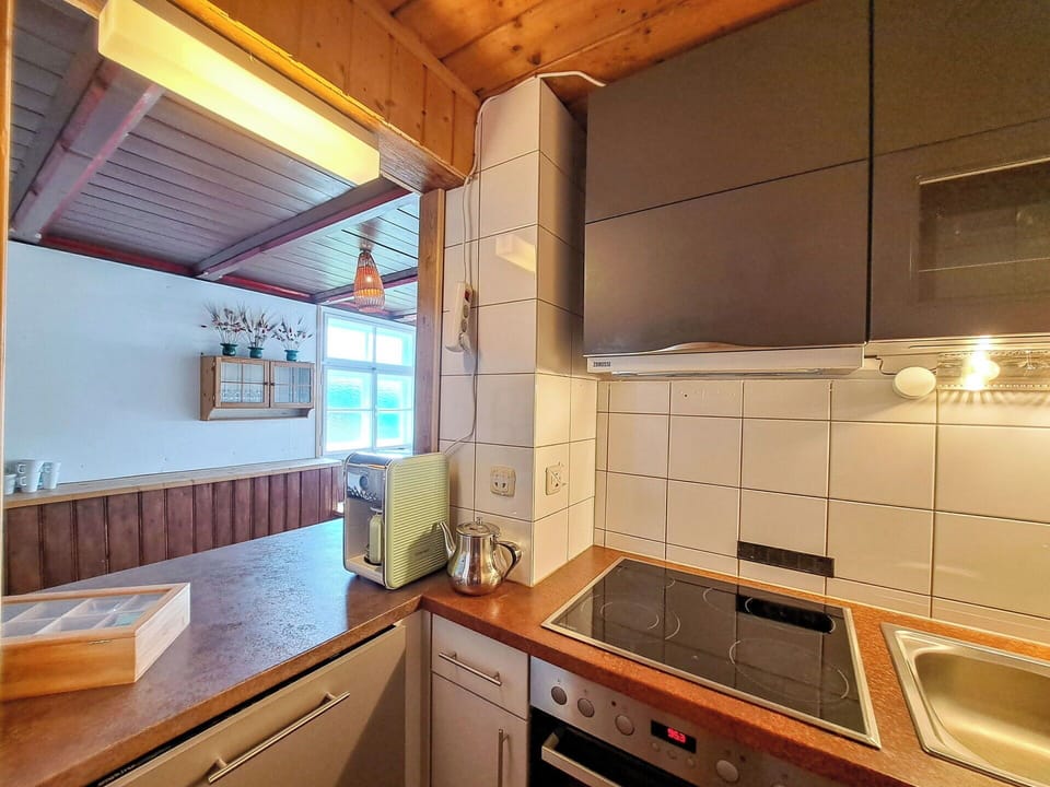 Kitchen, Flooring, Countertop, Interior Design, Floor, Wood, Major Appliance, Cabinetry, Ceiling, Kitchen Appliance