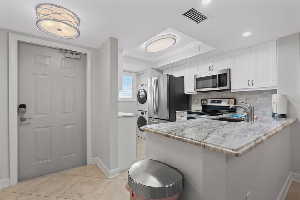 Kitchen next to front door.