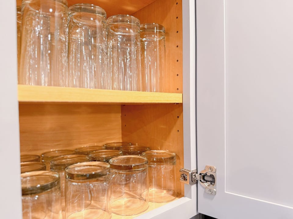 Fully stocked glassware and drinkware for entertaining and dining.