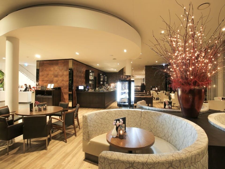 Stretch out in your airy suite with stylish, modern comfort.