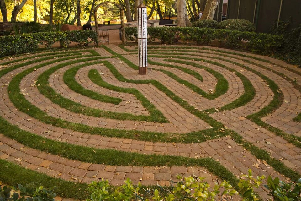 Wander the peaceful labyrinth path for a mindful reset