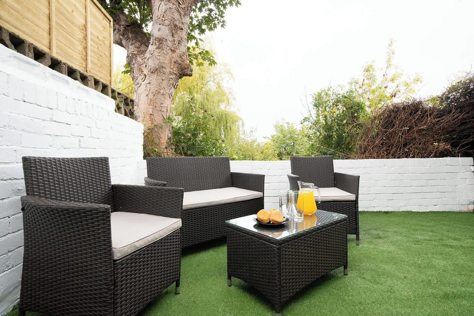 Sunny outdoor space with comfy seating – enjoy your morning brew or unwind after work in peace.