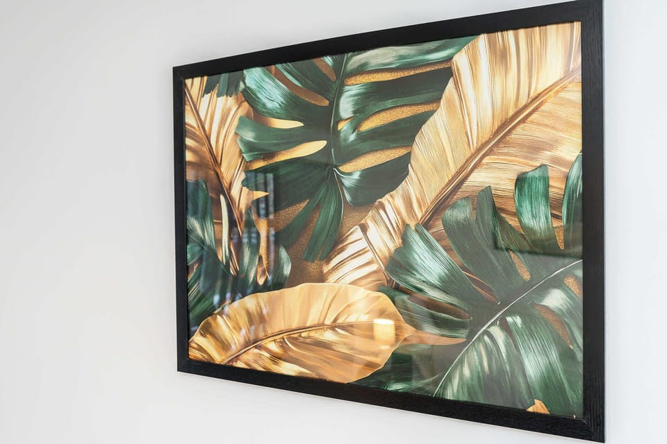 Simple, modern artwork adding a calm, finished feel to the room.