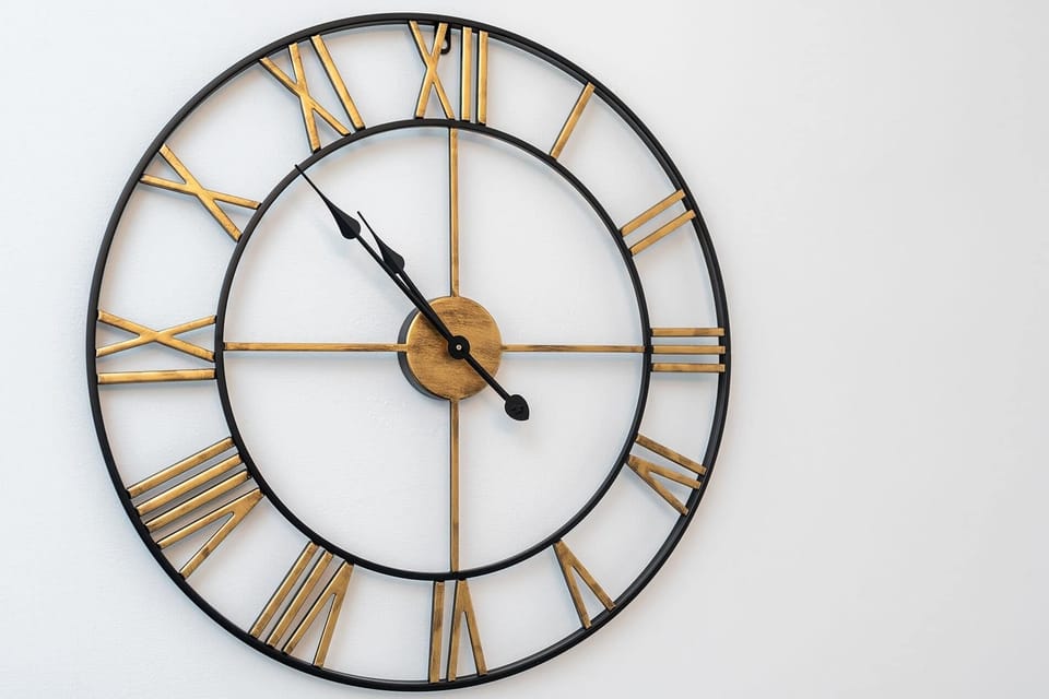 Stylish wall clock adding a simple, modern touch to the space.