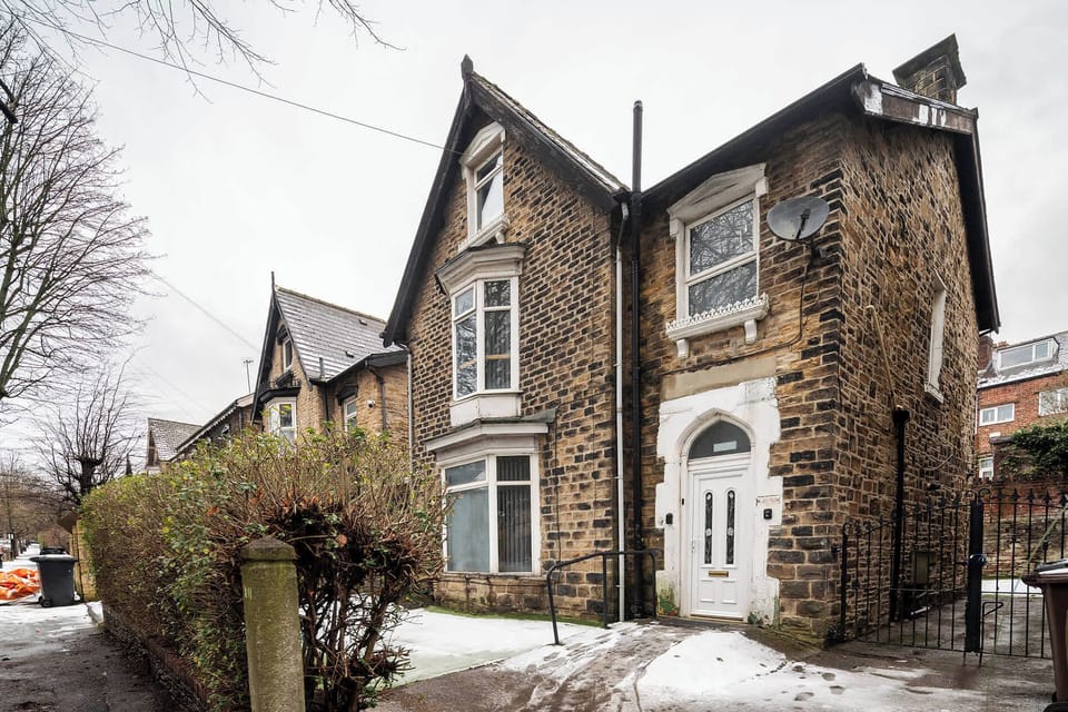Attractive stone-fronted property with classic character and a welcoming entrance.
