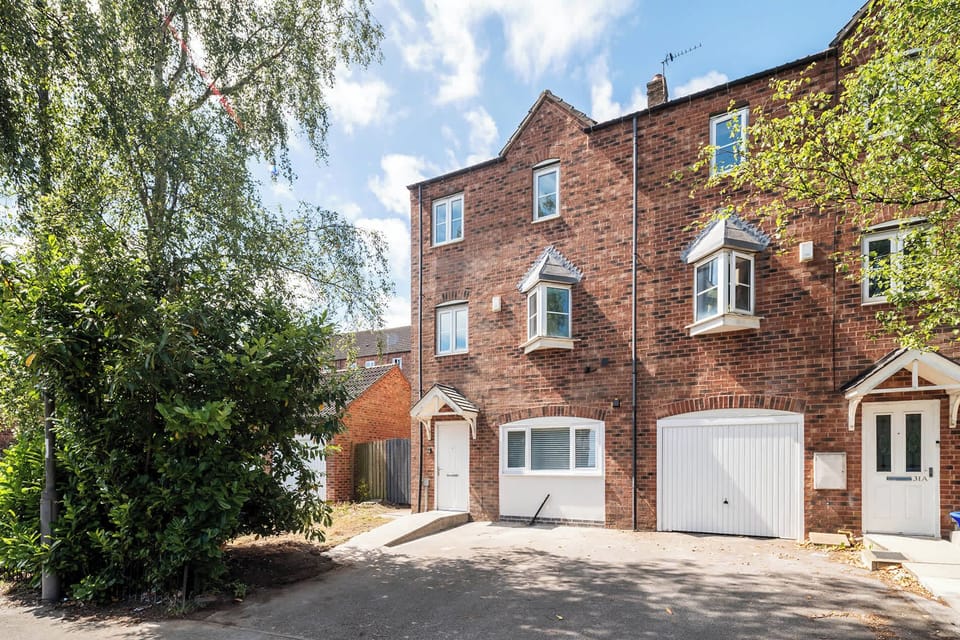 A spacious front area that provides plenty of room for parking or outdoor activities