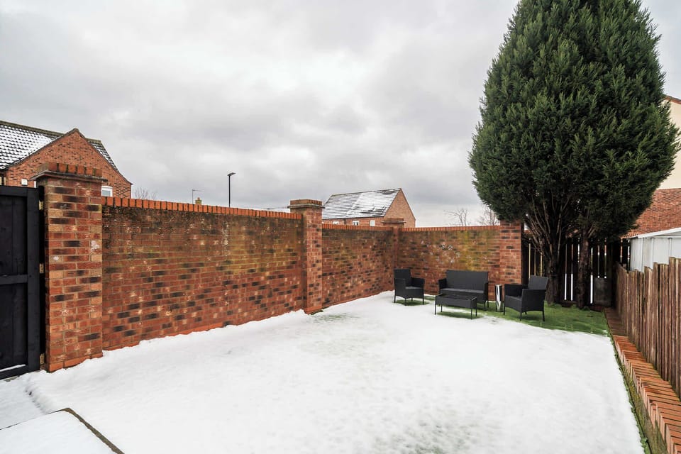 Private outdoor space with seating, ideal for enjoying some fresh air or a quiet break outside.