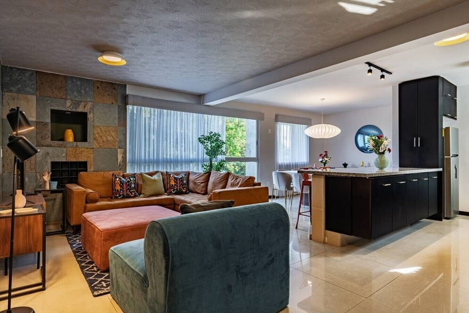 Enjoy group time in the open-concept living space, with comfortable seating.