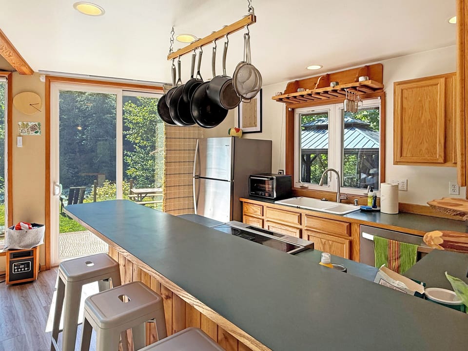 Fully stocked kitchen - air-fryer, ice maker, coffee maker, spices, and pots/pan