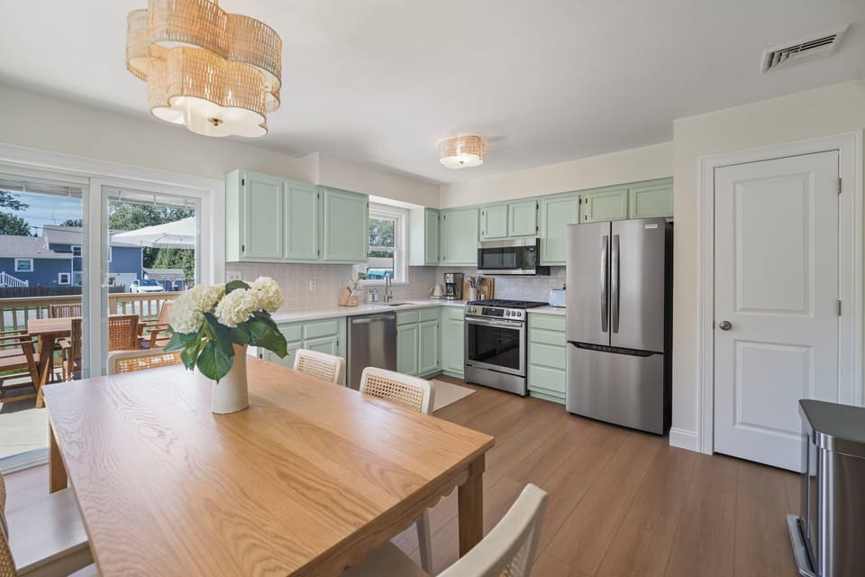 Cook and gather in this newly updated kitchen with coastal charm.