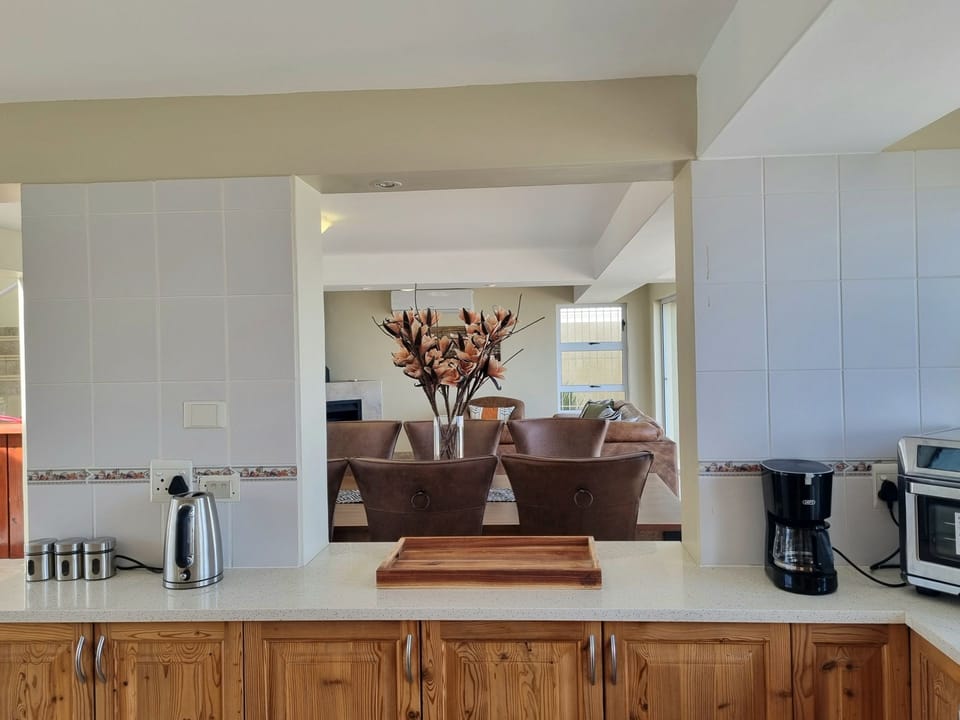 The view of the dining table from the kitchen