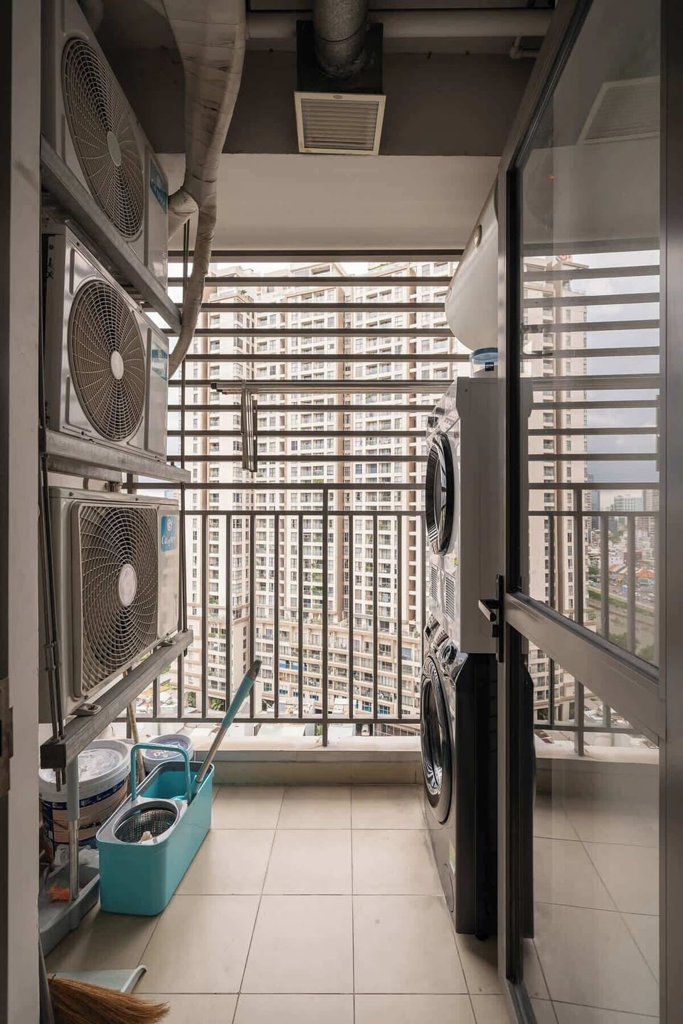 Laundry balcony featuring a large brand new washer and dryer able for all guest usage.