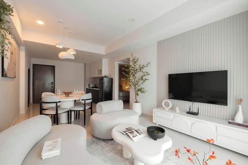 Spacious & Minimalistic Design, equipped with a comfortable sofa that fits 3, with a single seater sofa, ideal for families and friends to gather around and watch on a 55inch 4k smart tv. 