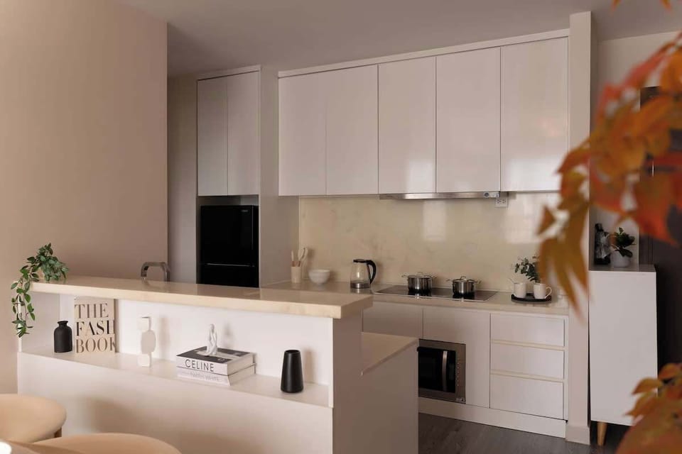 Our modern full kitchen is equipped for self-catering, featuring a fridge/freezer and basic cooking utensils. We also provide stylish beer cups and wine glasses for your beverages. There is a mini mart to buy ingredients right downstairs!