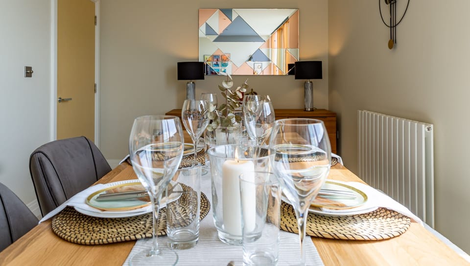The dining table looks out onto views of Bristol Harbourside