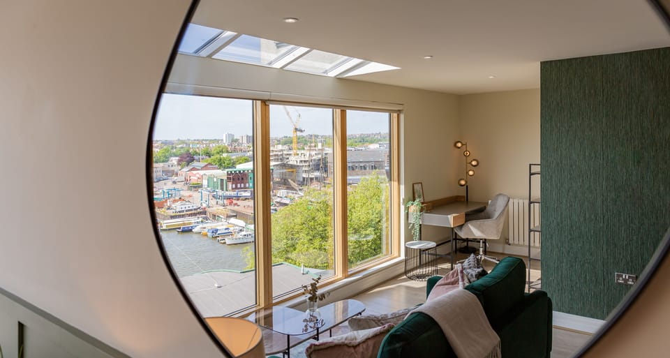 The living room looks out over the Bristol Harbourside area