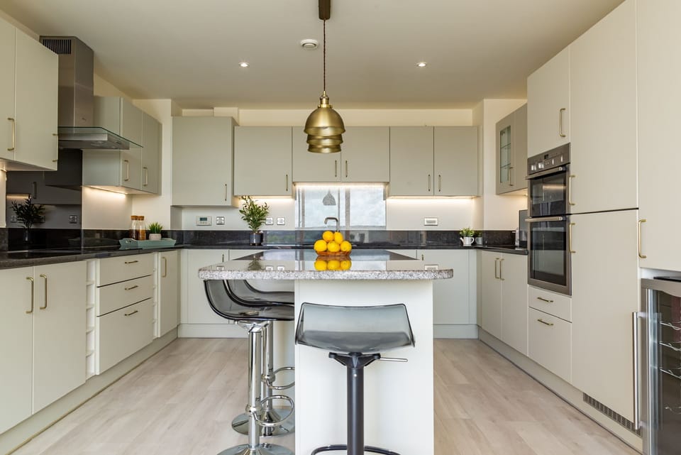 The kitchen is fully equipped, including a dishwasher, fridge/freezer and Nespresso machine
