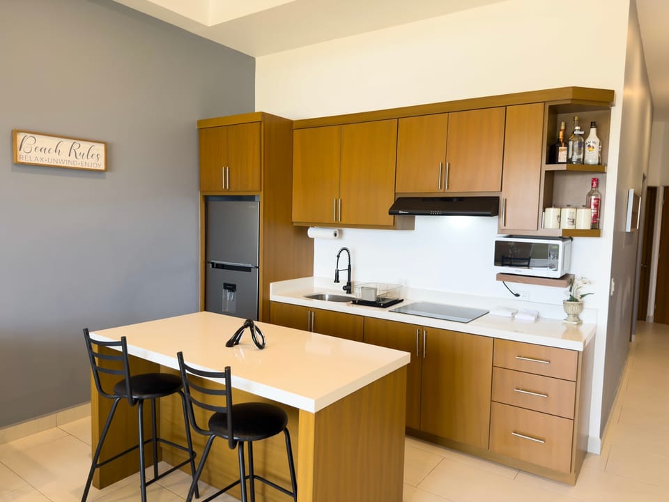 Grab a quick bite or morning coffee at the convenient island.