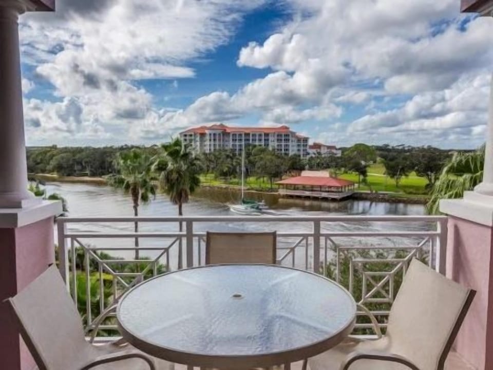 Private balcony with waterway views and gentle morning light — a quiet start to any day here