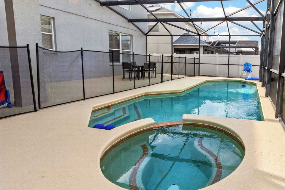 🏊 PRIVATE POOL OASIS

The outdoor space includes:

☀️ Four lounge chairs
🛡️ Child safety fence around the pool
🌴 Fully screened enclosure
🌿 Fully fenced backyard for additional privacy