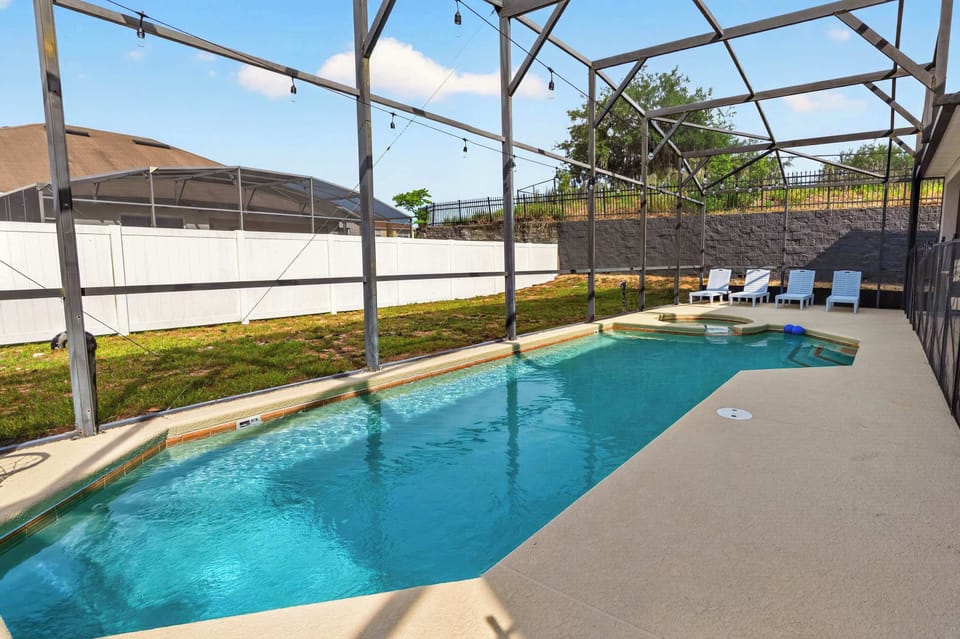 🏊 PRIVATE POOL OASIS

The outdoor space includes:

☀️ Four lounge chairs
🛡️ Child safety fence around the pool
🌴 Fully screened enclosure
🌿 Fully fenced backyard for additional privacy